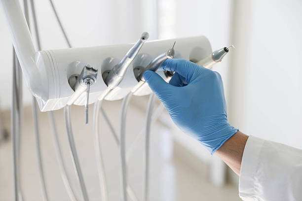 Professional Tooth Extraction technician working in El Granada, CA
